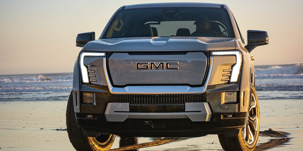 Sierra EV Denali parked on a beach